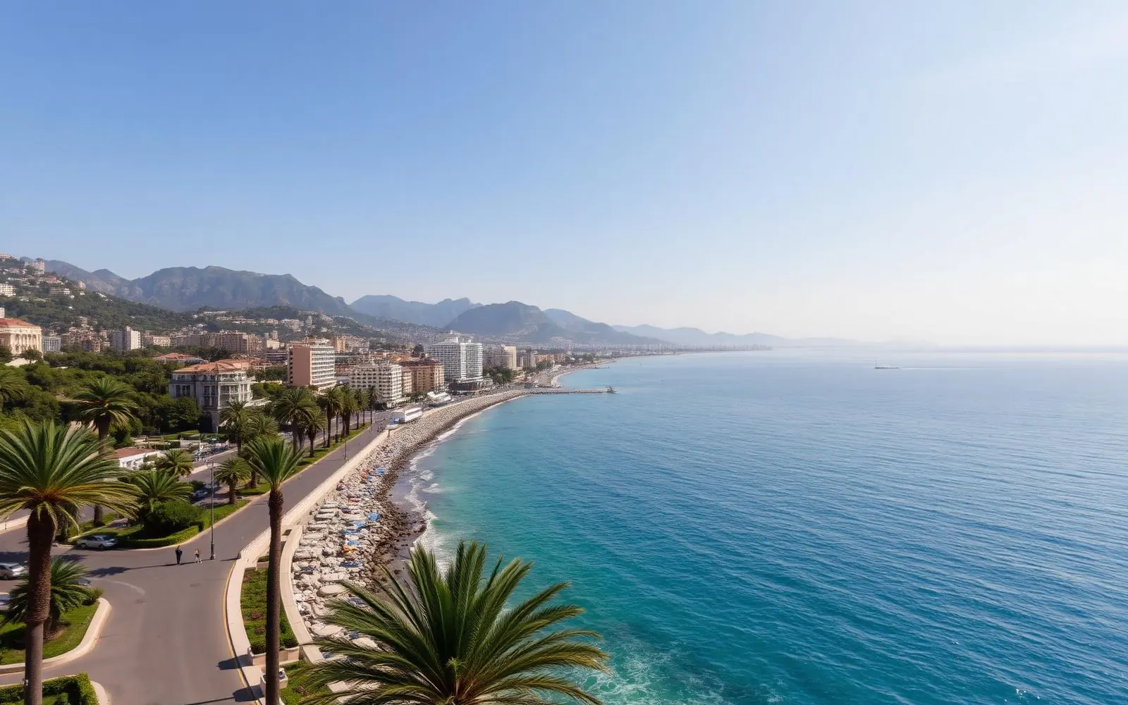 French Riviera coastline with turquoise sea and pastel houses